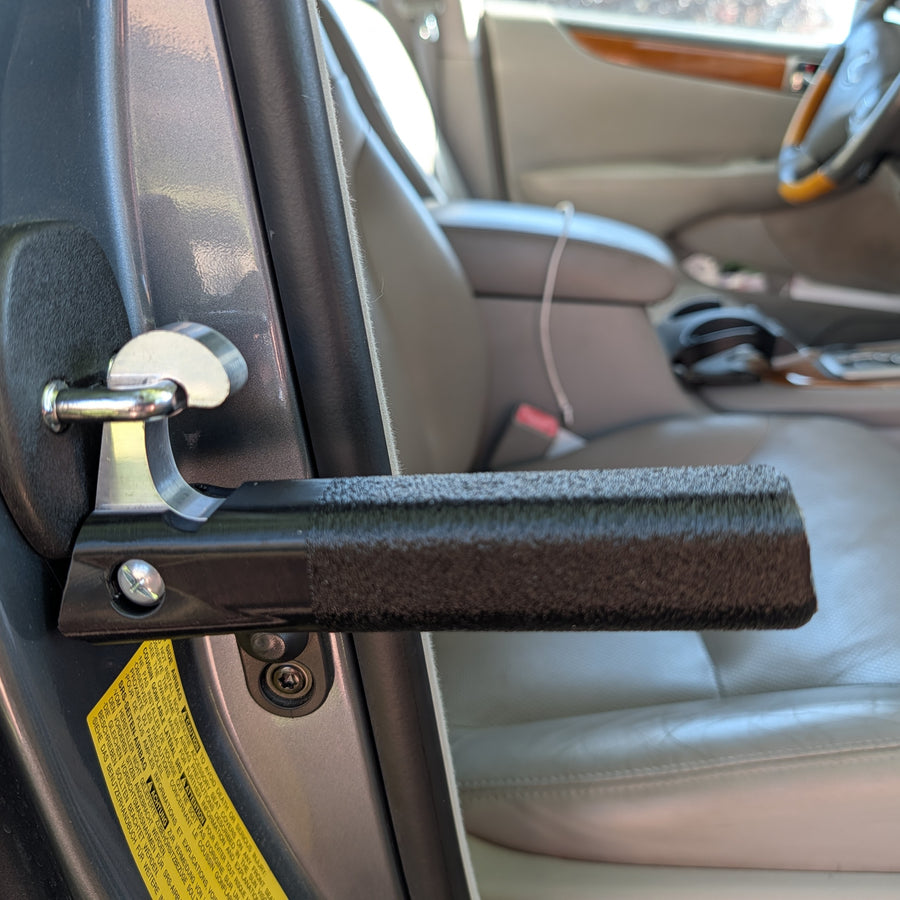 Hand placed on the padded Assist Anchor grip